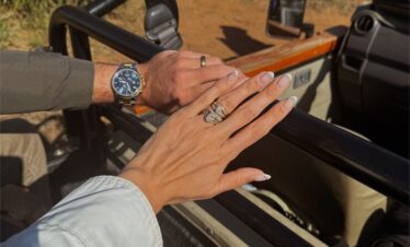 Couple on private game drive during Queen Elizabeth National Park romantic honeymoon safari