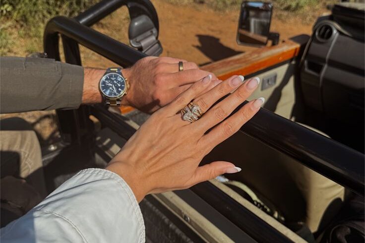 Couple on private game drive during Queen Elizabeth National Park romantic honeymoon safari